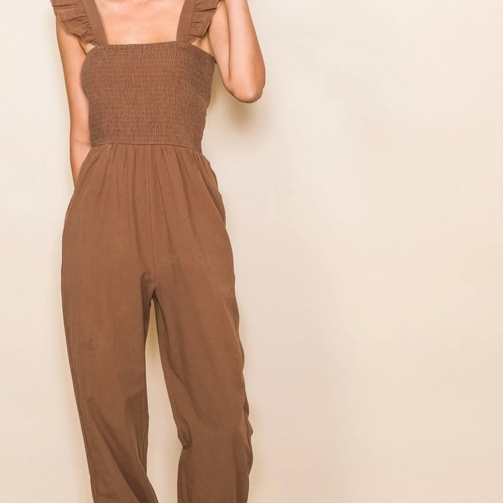 
                  
                    Flutter Sleeve Woven Smocked Jogger Jumpsuit with Pockets
                  
                