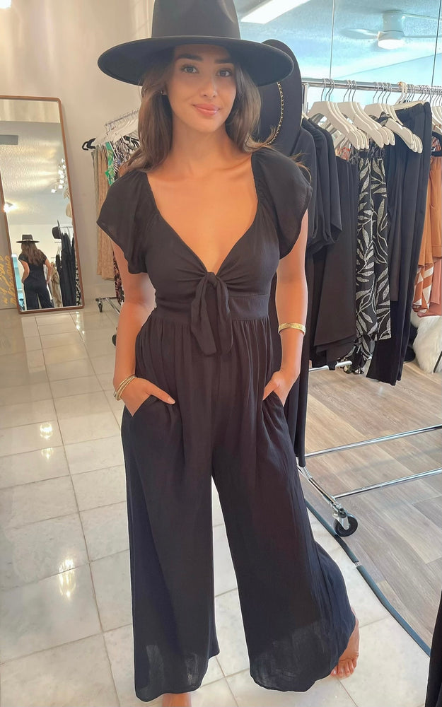 
                  
                    Flutter Sleeve Front Tie Jumpsuit with Pockets
                  
                