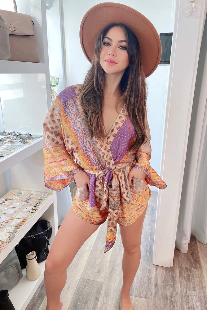 
                  
                    Printed Kimono L/S Romper with Pockets and Tie Waist Belt
                  
                