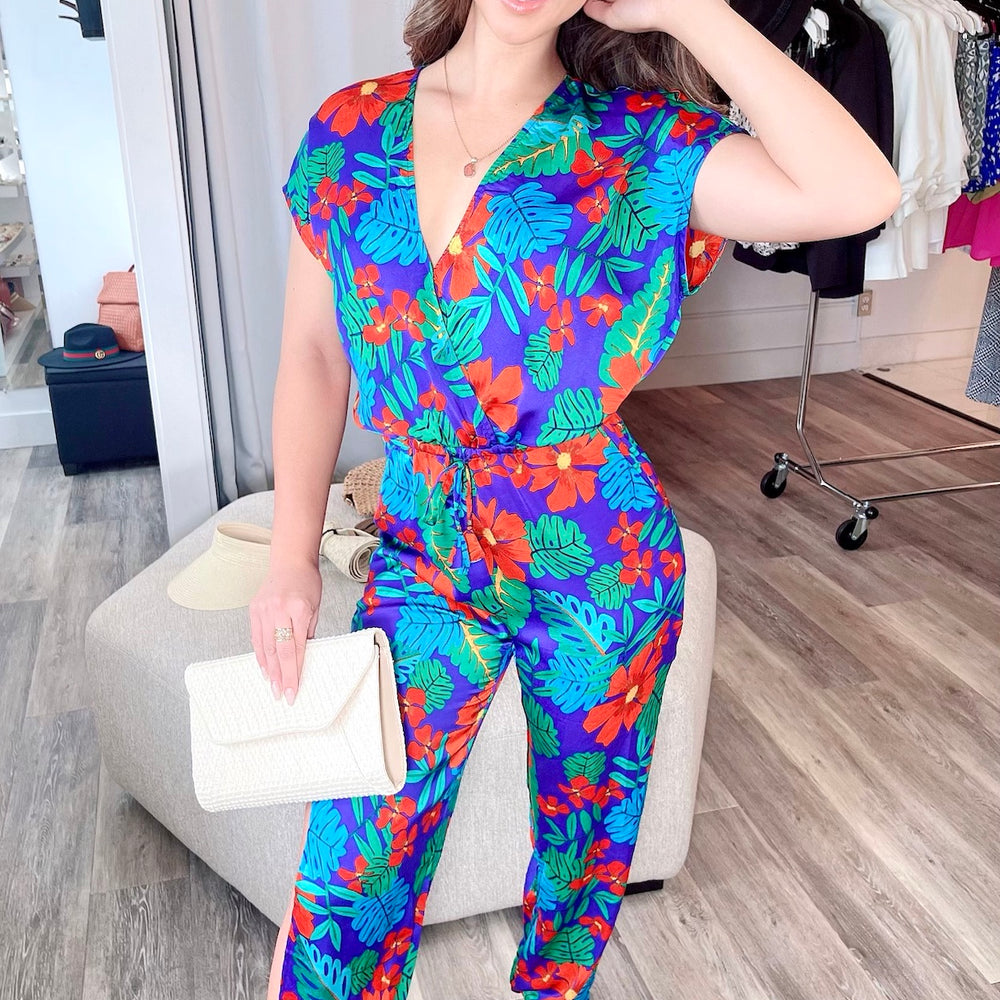 
                      
                        FINAL SALE- Printed Woven Draped Front Jumpsuit with Ankle Tie Detail
                      
                    